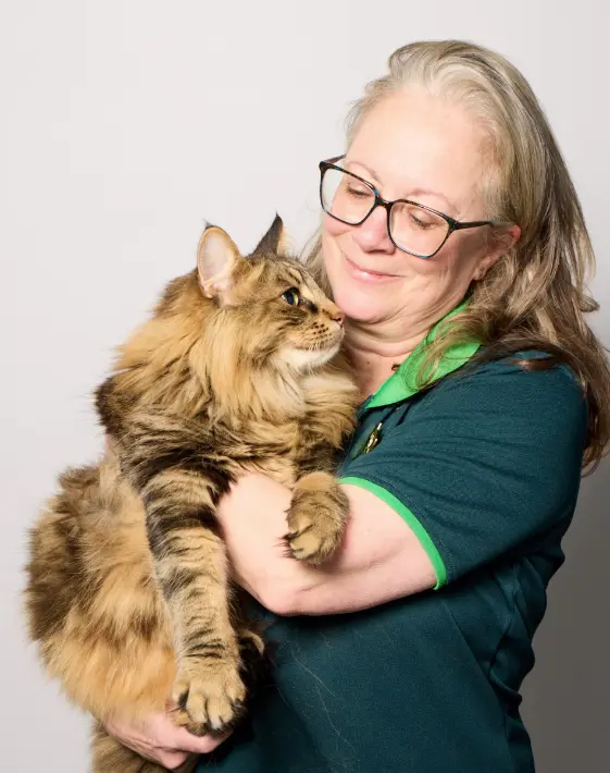 Smiling woman with cat